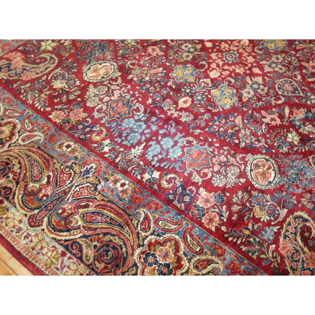 A rare size early 20th century Persian Sarouk rug. 10'3'' x 10'3'' Designed for a regional aristocratic clientele, the...