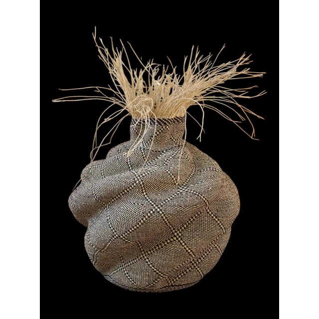 Yamayama rasta creates ridges, valleys, and contours that read, from a distance, like an aerial view of landscape. Three...