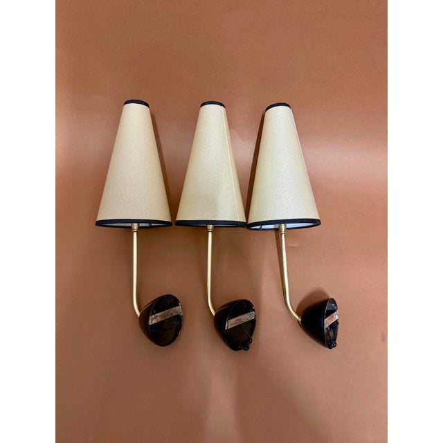 Jean Royere style wall light, black lacquered brass with beige paper lampshade European Plug (up to 250V).The wiring of...