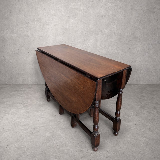 Vintage Oak Drop Leaf Dining Table, 1950s, in Worn conditions. Designed 1950 to 1959