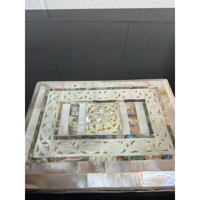 Charming vintage hand, carved mother of pearl and abalone jewelry box from the holy land.