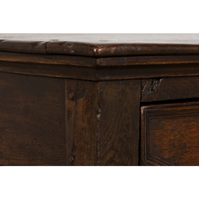 Late 18th century English oak dresser base, sourced in Lyon, France, and dating to circa 1780. Crafted from solid oak, the...