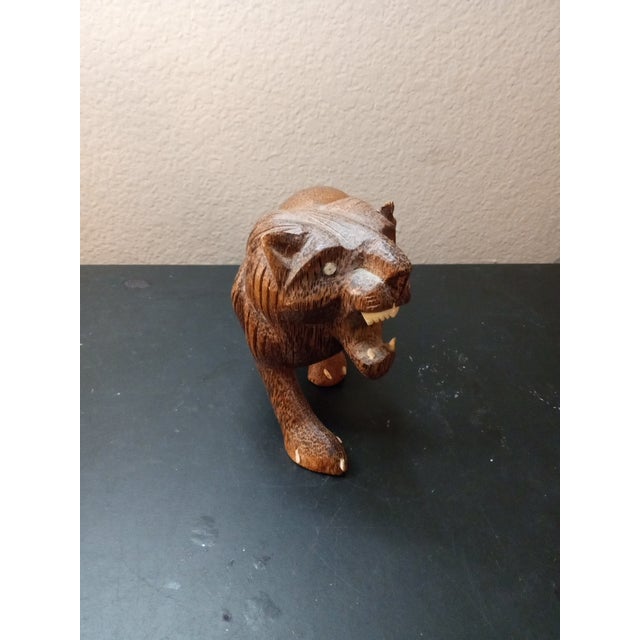 Hand carved 7" Lion Sculpture This magnificent Lion Sculpture is a stunning addition to any collection. Hand carved with...