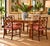 Elegant set of four 1960s English Georgian Chinese Chippendale-style Cockpen dining chairs, featuring beautifully crafted...