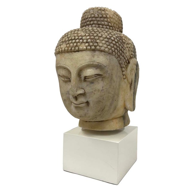 This magnificent Chinese Antique Carved Stone Buddha Head was handcrafted dated back to 1900s and shows very detailed hand...