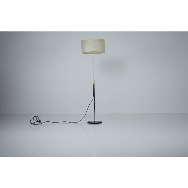 Height-adjustable floor lamp with pull switch from the 1960s. Marked "Stiegler" on the base. We were unable to attribute...