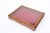 A vintage tabletop collector's display case in a burl wood frame in warm amber tones, gilt glazed lid, red felt-lined...
