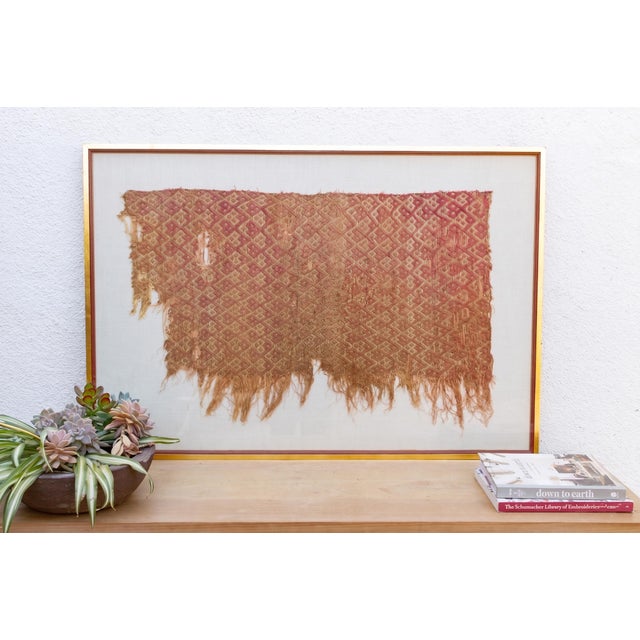 A monumental architectural panel showcasing ancient Andean horizontal symmetry and centuries-old master weaving. This...