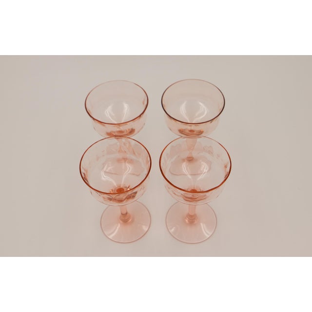 Beautiful set of four pink glasses.