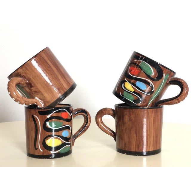 Set of 4 hand-painted ceramic cups from the 60s deruta - made in italy - perfect conditions measurements: height 8.5 cm -...