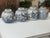4 , YES 4 GINGER JARS IN BLUE/WHITE PORCELAIN 9" ,ALL DIFFERNT DESIGNS. .Use two on fireplace, bookshelves, end tables