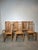 Beautiful set of six solid teak dining chairs featuring a timeless high slatted back design. The elegant vertical lines...