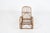 Pretty stunning little rocking chair made of bamboo and rattan. In good condition with some loose rattan pieces. No label...