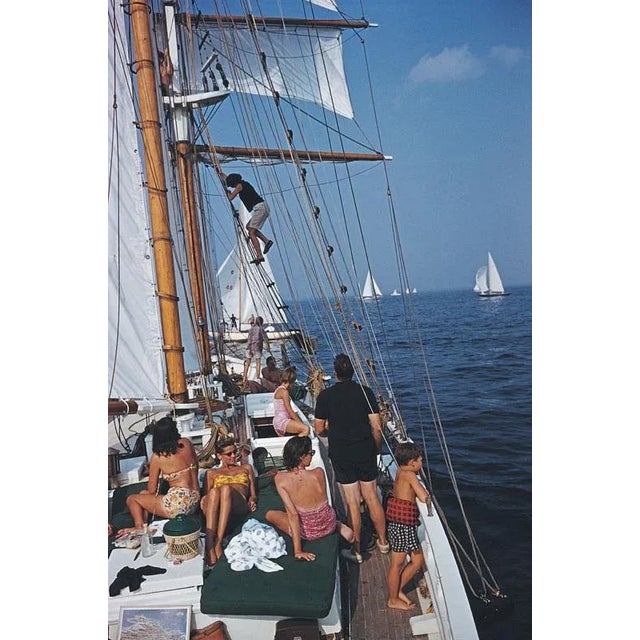 Sailing Off Boston 1959 Henry B. Cabot Jr. (in black) on Barclay (Buzzy) H Warburton III’s brigantine ‘Black Pearl’, circa...