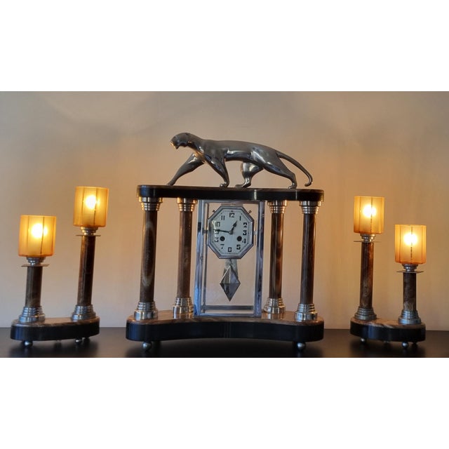 An iconic Art Deco clock by the renowned artist of Art Deco period, Michel Decoux. This exceptional piece boasts a highly...