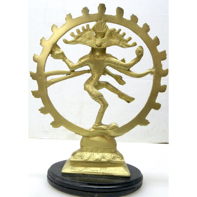 This mid-century vintage brass sculpture depicts Lord Shiva performing his cosmic dance as Nataraja, the divine king of...