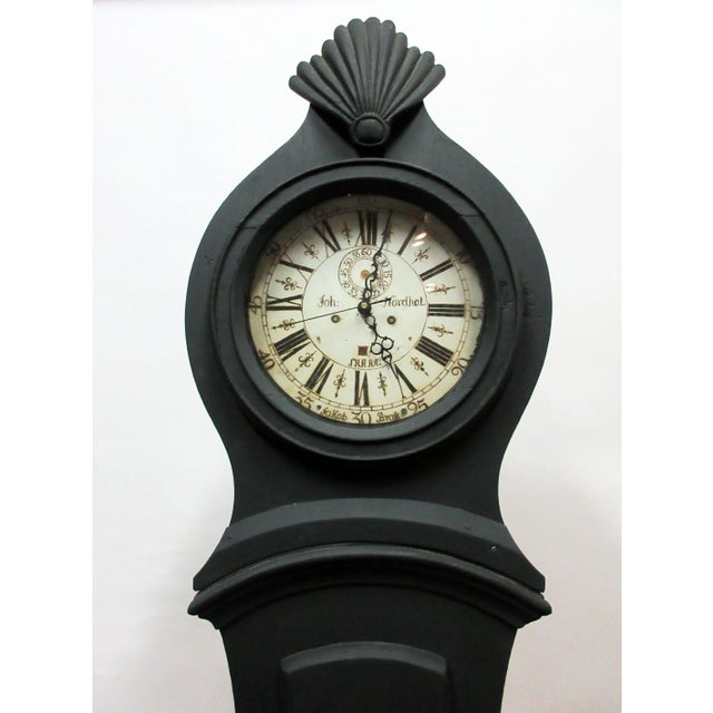 This is a Swedish long case Mora clock. It's been restored and repainted with Milk paints "Midnight Black ".