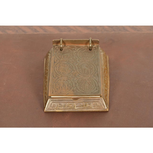 A gorgeous antique Arts & Crafts or Art Deco period "Zodiac" pattern bronze perpetual desk calendar holder or stationery...