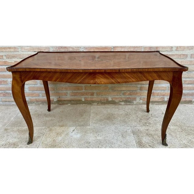 Wonderful French marquetry and gilt bronze table that can be used as a coffee table, coffee table or side table.