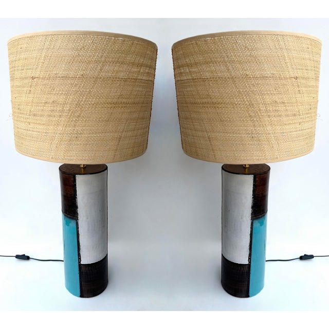 Mid-Century Modern Pair of table or bedside lamps in enameled ceramic terracotta Mondrian decor, brass detail by the...