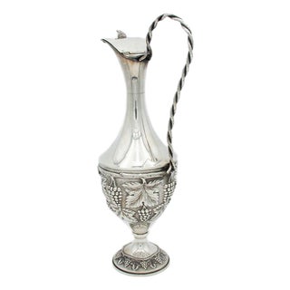 Silver Wine Jug with Curls and Leaves in Relief For Sale