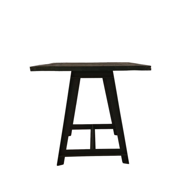 This is a beautiful reclaimed wood side table that has great grain patterns and a sturdy metal base. The finish has been...