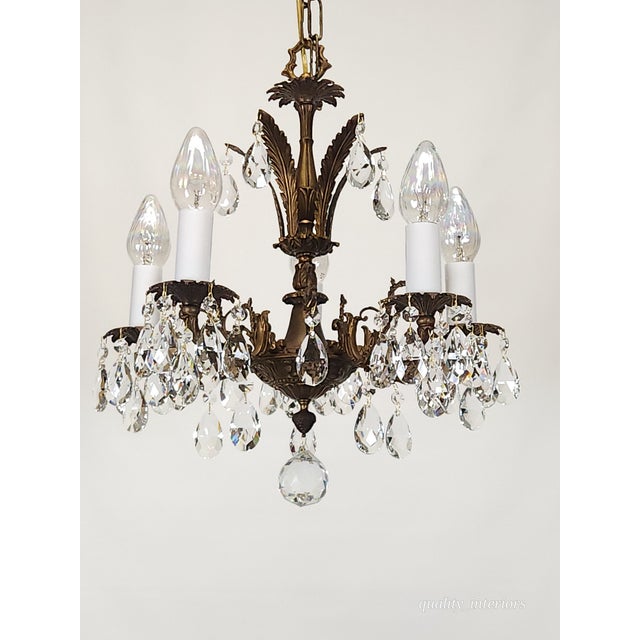 Offered for your consideration is an Antique Overflowing Dark Patina Ornate Bronze Cut Lead Glass Crystal Chandelier. The...