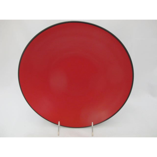 Modern and sleek, Gump's pottery dinner plate set of 4 in red and black Worldview pattern. Red at top, black at base. Each...