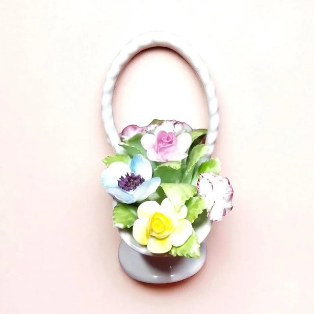 Royal Doulton England Bone China Basket of Flowers . Appears to be from 1960's. Stamp on bottom was changed in the 70's....