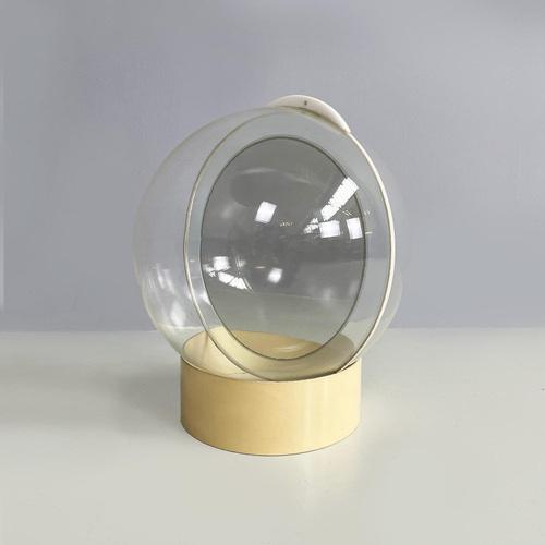 Table mirror model 4720/s, composed of two parts, a cylindrical plastic base which has slightly yellowed over time and a...