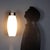 Wall lamp produced by Stilnovo in the 1960s, featuring an elegant and functional design. The mount is made of aluminum...