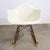 1959-1962 Charles and Ray Eames designed white rocker armshell with original rocker base. original screws throughout....