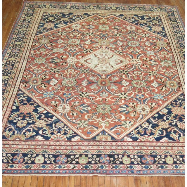 an early 20th Century Persian Mahal Room Size Rug. Profesionally Cleaned and ready to find a new home