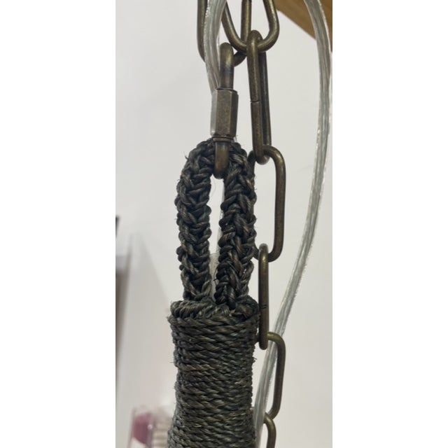 These are oversized woven, wicker hanging pendants made by Palecek., from the Kirk Nix collection. They were ordered for a...