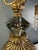 An elaborate vintage Loevsky & Loevsky (L&L WMC) table lamp combining ornate gold-tone metalwork with sparkling crystal...