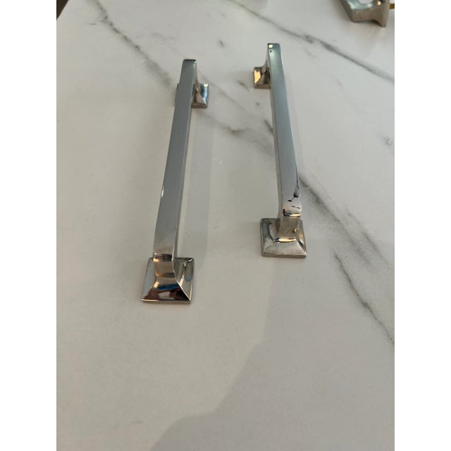 Katonah Hardware appliance pulls minor nicks as seen in photos. One pull has a tiny nick in the center as seen in photos....