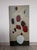 Original acrylic painting featuring abstract red floral shapes arranged in a white vase on a neutral light background. The...