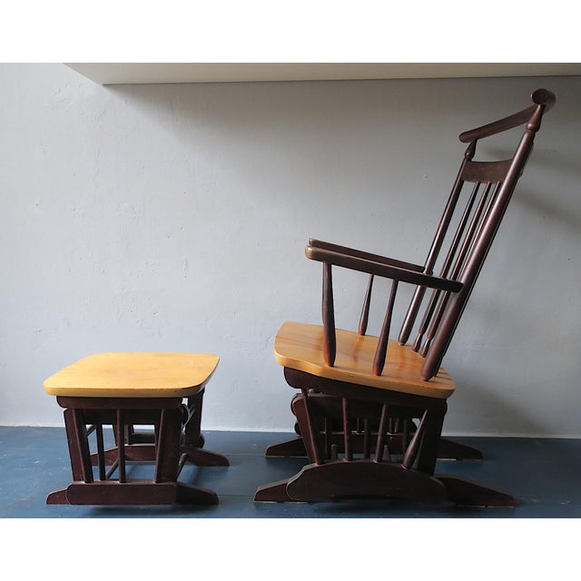 Unusual vintage gliding / recliner lounge chair and footrest with ebonised frame and shaped birchwood seat, from the...