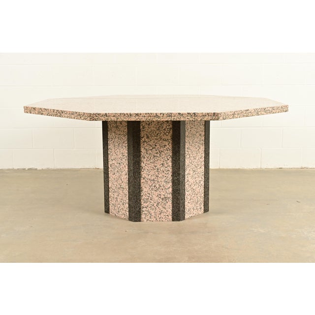 A gorgeous Modern Italian pedestal dining table In the manner of Ello Italy, Circa 1980s Beautiful thick Italian granite...