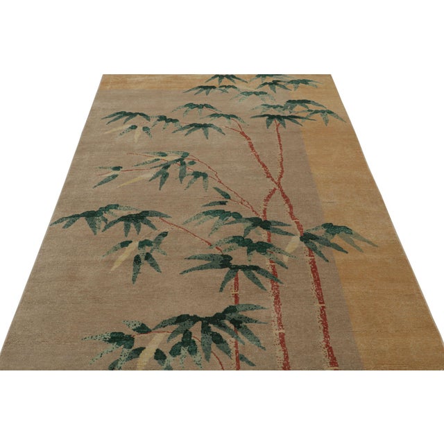 Hand-knotted in wool, this 5x8 modern fragment rug has been inspired by the Chinese Deco style. Featuring floral patterns...