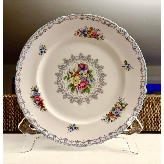 Six Shelley Fine Bone China floral and scenic design plates made in England. All are in like new condition. Each plate is...