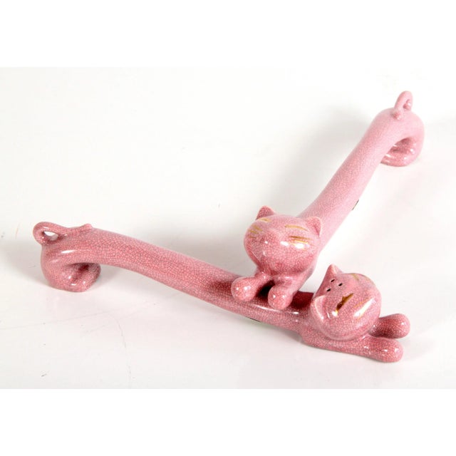 Absolutely ADORABLE pair of vintage c.1960's mid century modern pink stretching cats salt & pepper shakers! These are...