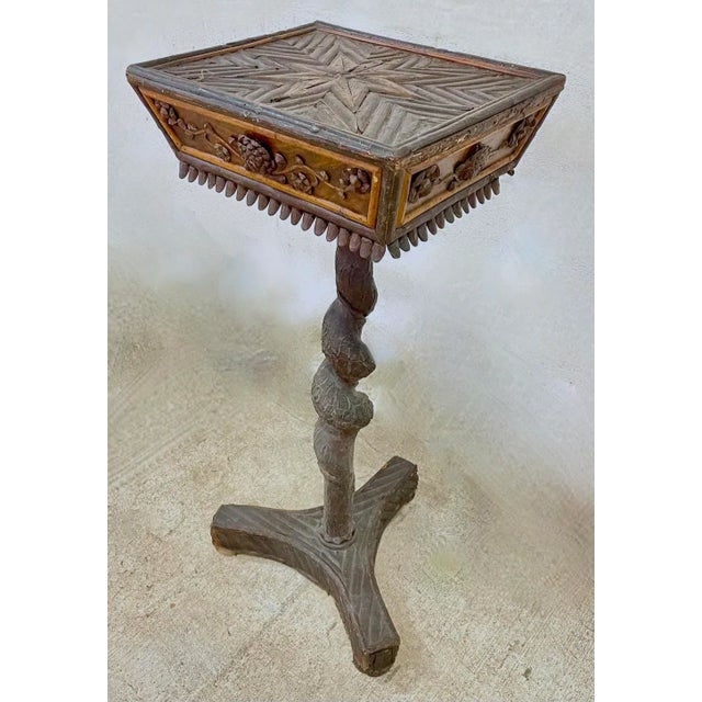 Antique French rustic branch and pine cone pedestal table with drawer. Barley twist branch support and branch pattern...