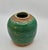 Midcentury French petite green glazed earthenware vase, 1950s.