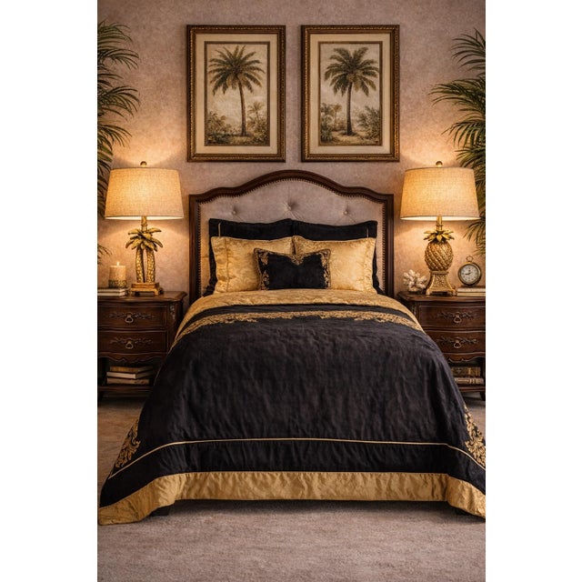 A striking pair of petite tropical accent lamps featuring sculptural palm tree and pineapple forms, newly styled with...