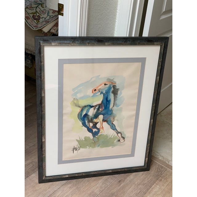 Midcentury original watercolor painting of a horse in motion. Matted and framed in an unusual slate blue and marbled color...