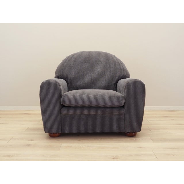 The armchair was made in the 1970s, Italian manufacture. Legs made of solid wood. The armchair has undergone upholstery...