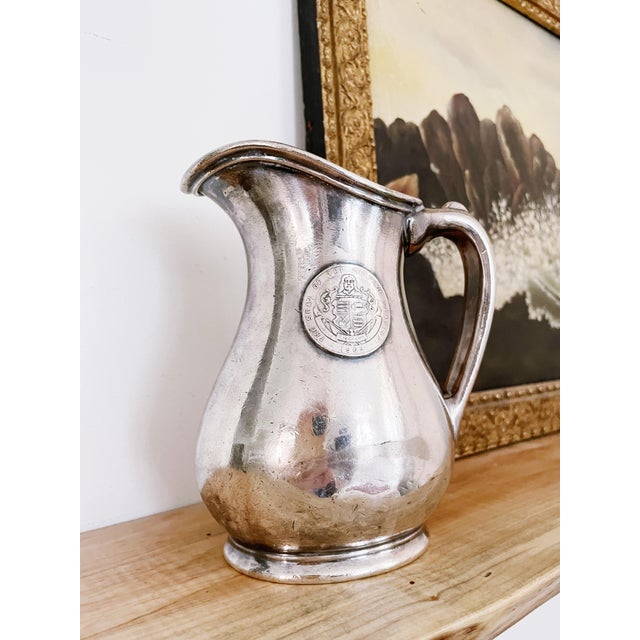 A rare antique circa 1909 silver plated souvenir cream or milk pitcher from The Alaska Yukon Pacific Exposition, held in...