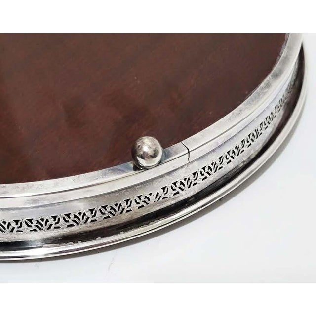Mid-Century Crescent Formica Footed Tray Wood Grain Silverplate Rim Crescent Formica Footed Tr The Manufacturer: This...