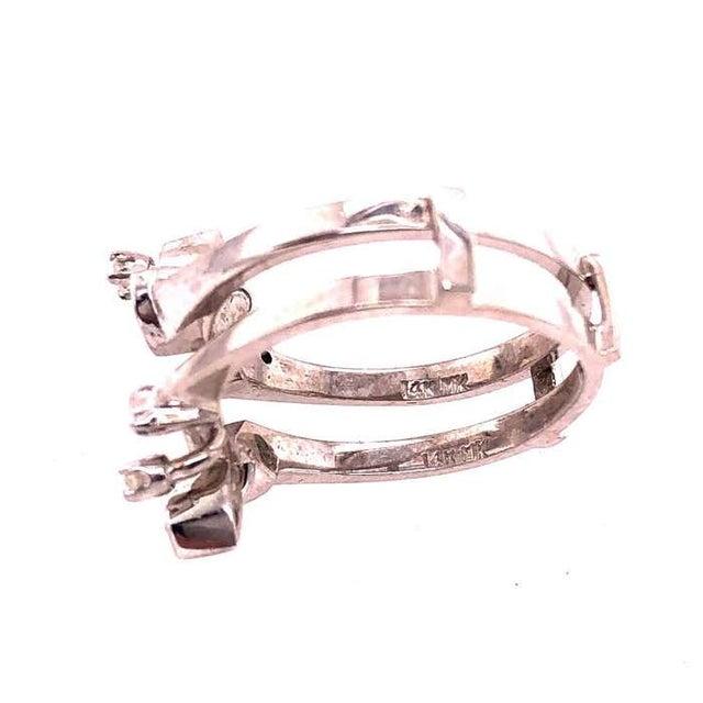 14 Karat White Gold Interlocking Engagement Ring Guard Size 6.25. 10 piece round diamonds 5.5 grams total weight. ring...